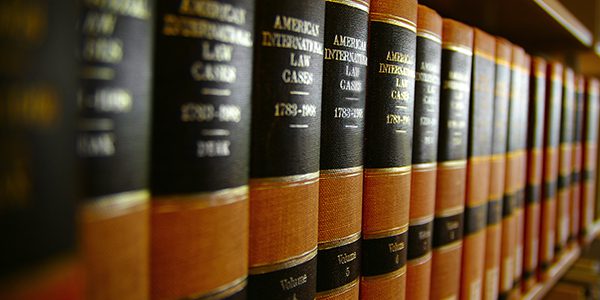Law case books on a bookshelf
